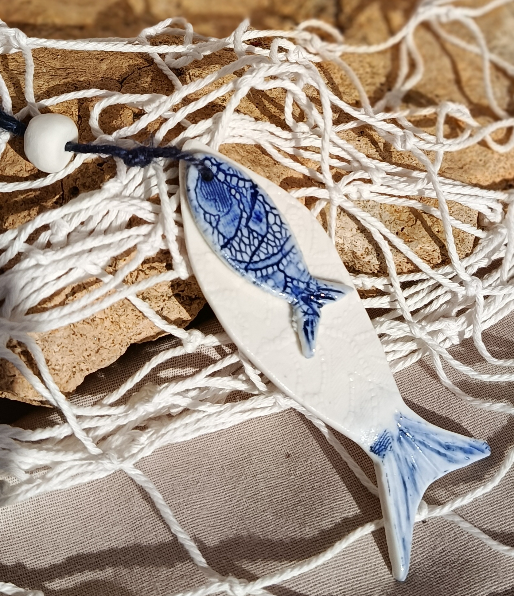 Suspension poissons en porcelaine