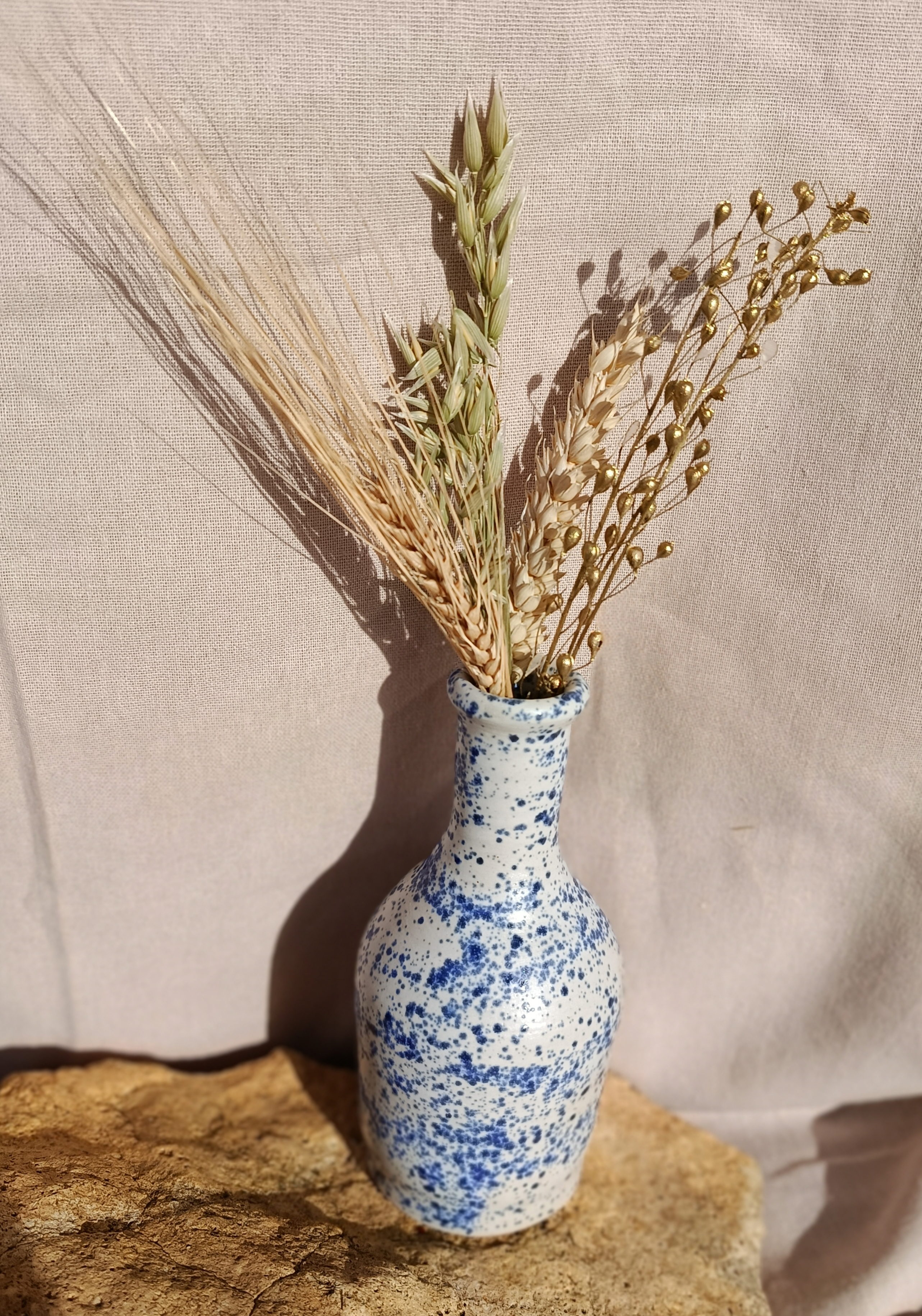 Soliflore en grès moucheté