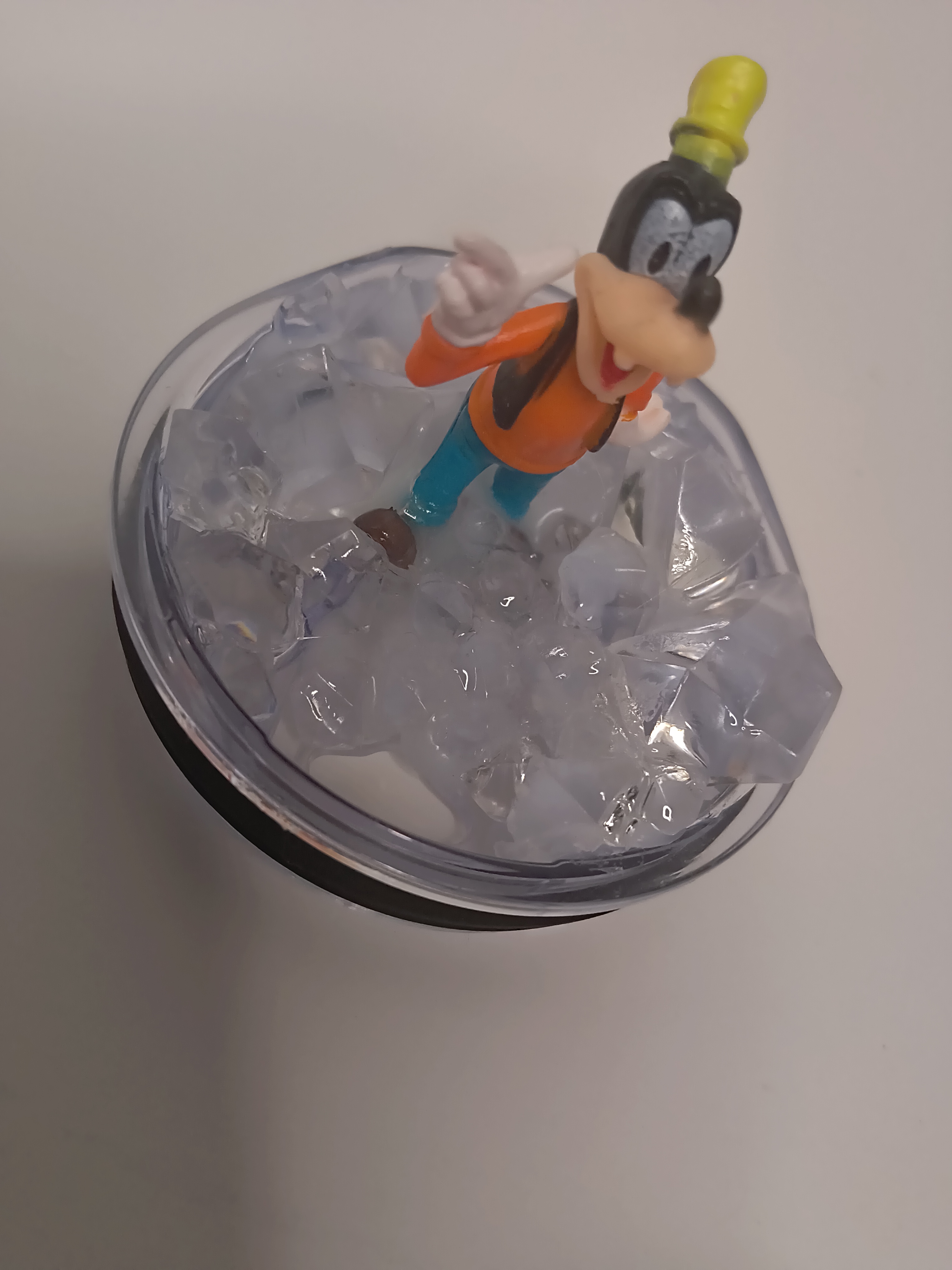 Goofy Figure on Ice Tumbler topper