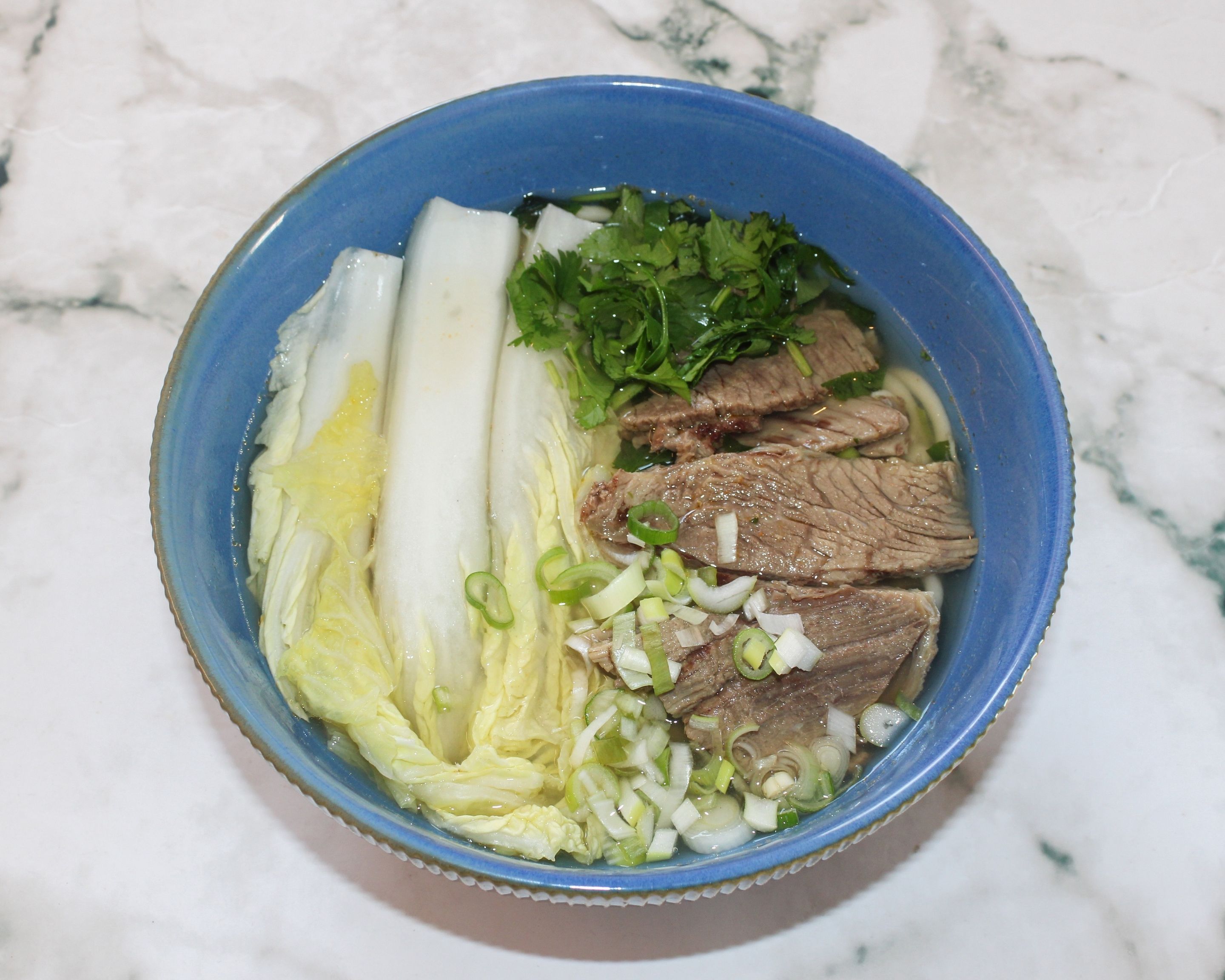 Rindernudeln - goldener Bruhe