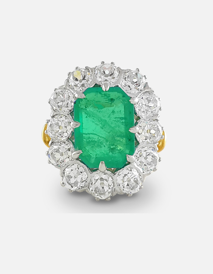 Emerald and Signature Adastra CZ Halo Ring