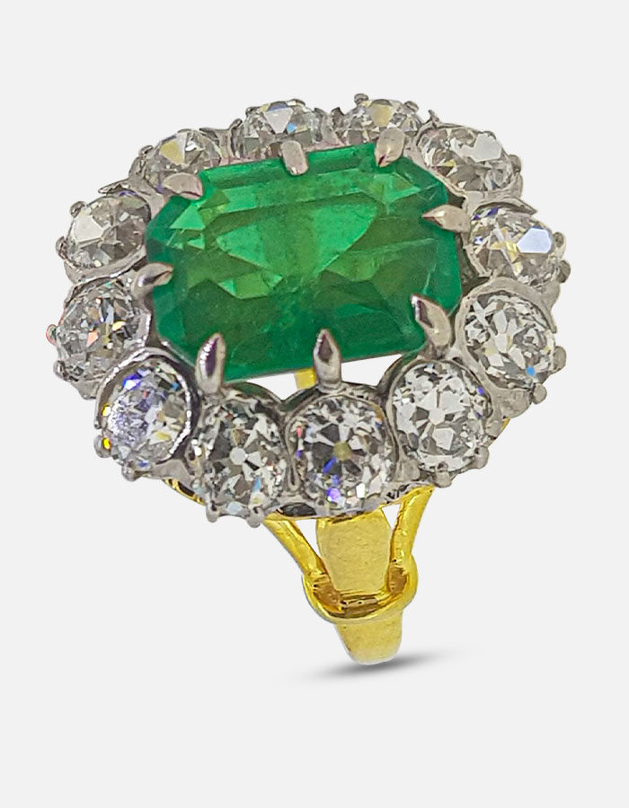 Emerald and Signature Adastra CZ Halo Ring