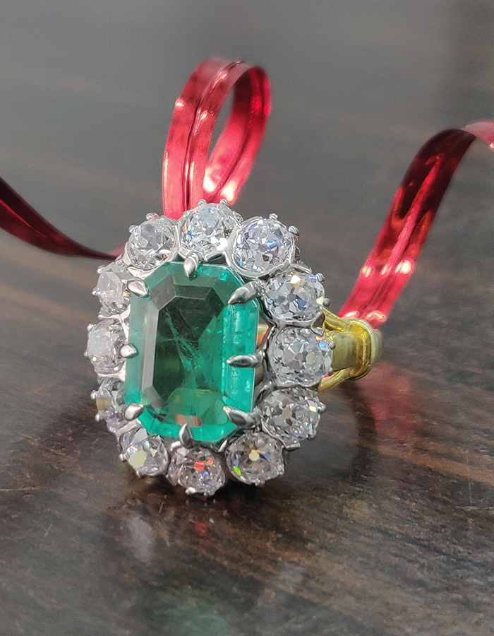 Emerald and Signature Adastra CZ Halo Ring