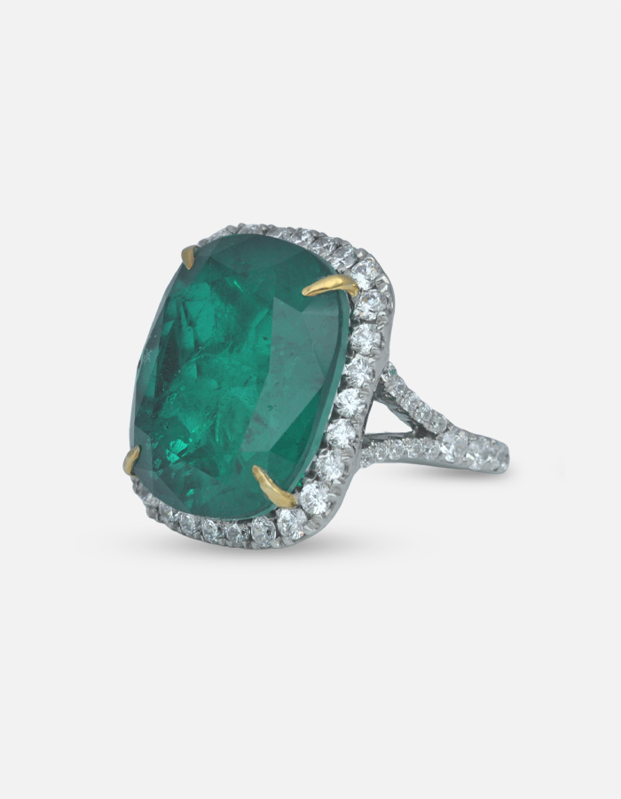 Emerald and Signature Adastra CZ Halo Ring