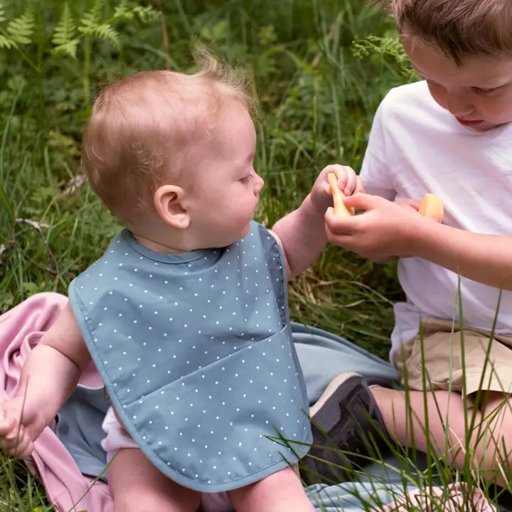 Kūdikių seilinukas su kišenėle