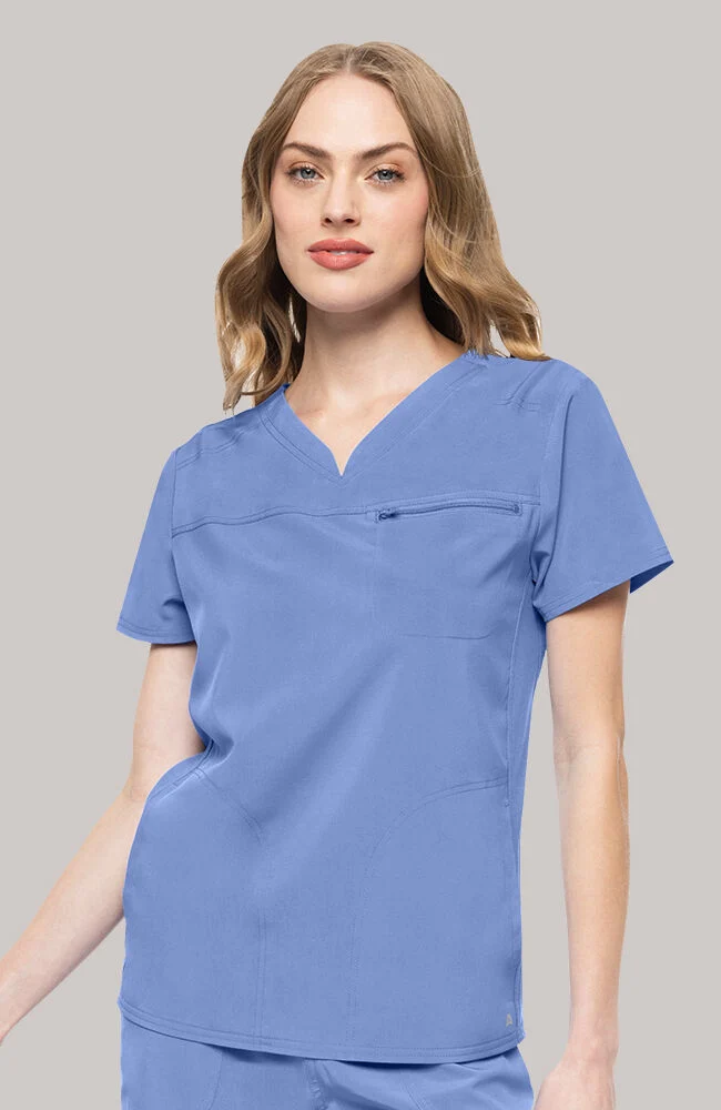 Blusa cuello V 3 bolsillos