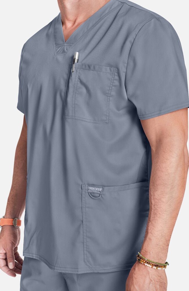 Blusa cuello V 3 bolsillos