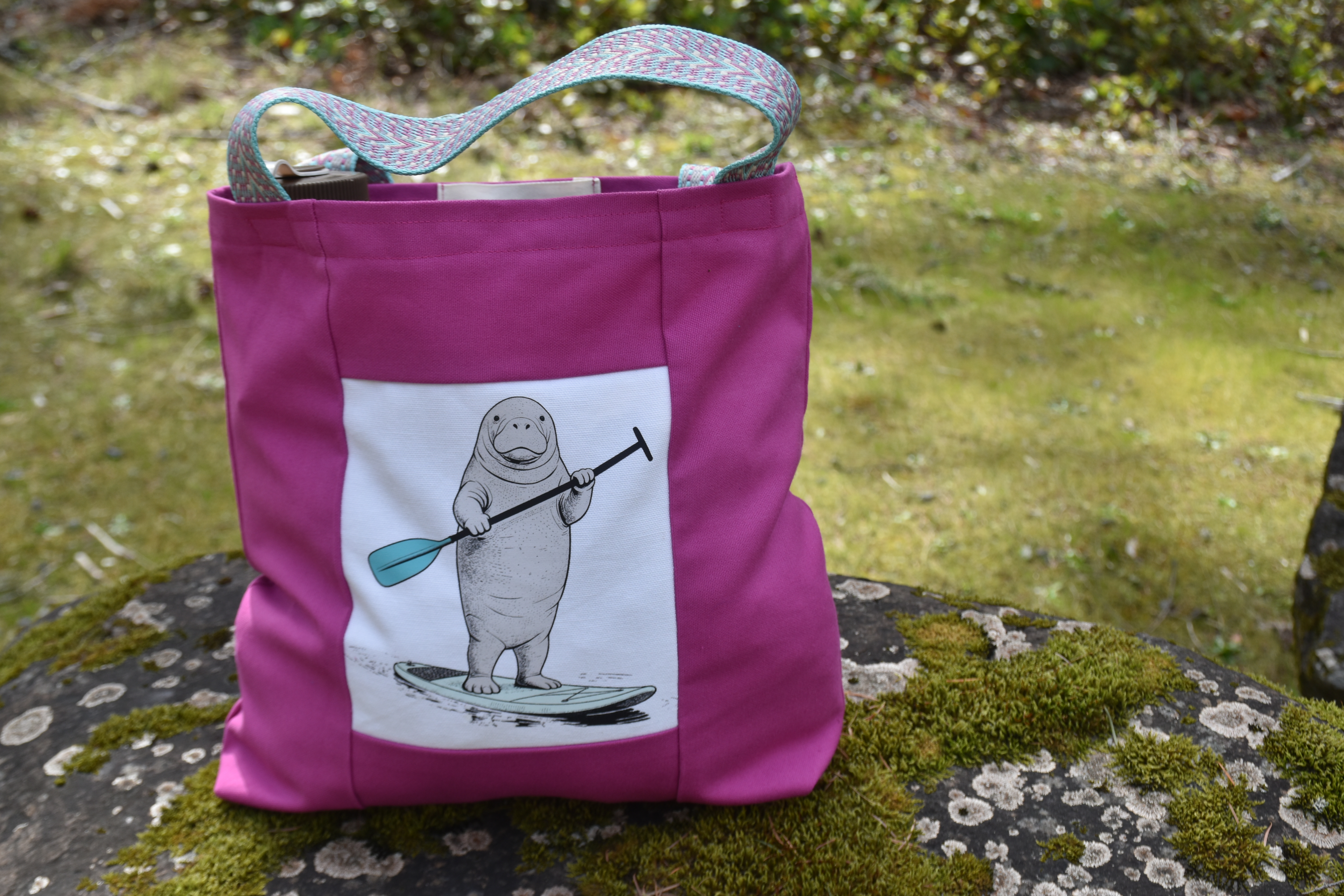 Manatee on a Paddleboard Tote Bag 