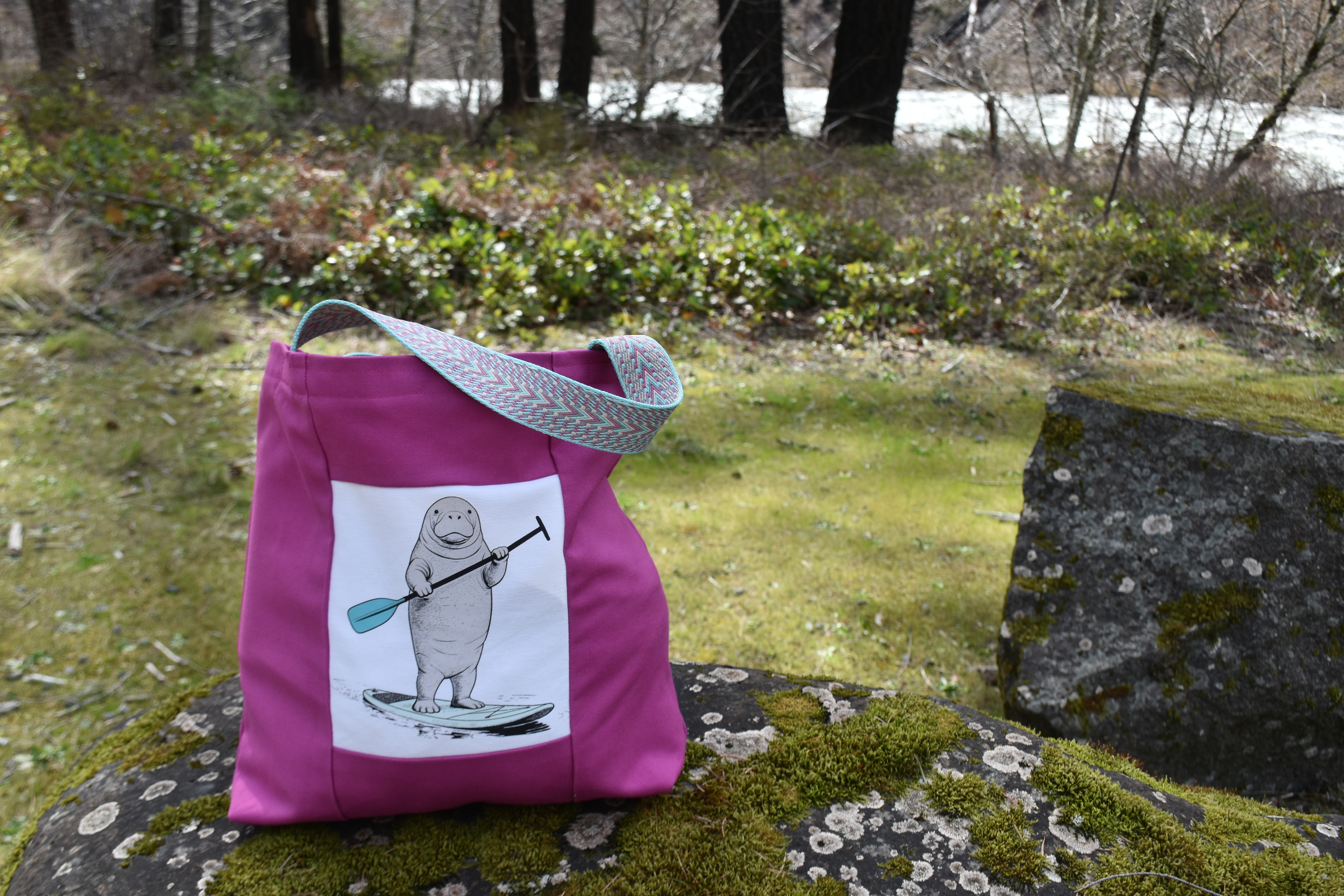 Manatee on a Paddleboard Tote Bag 