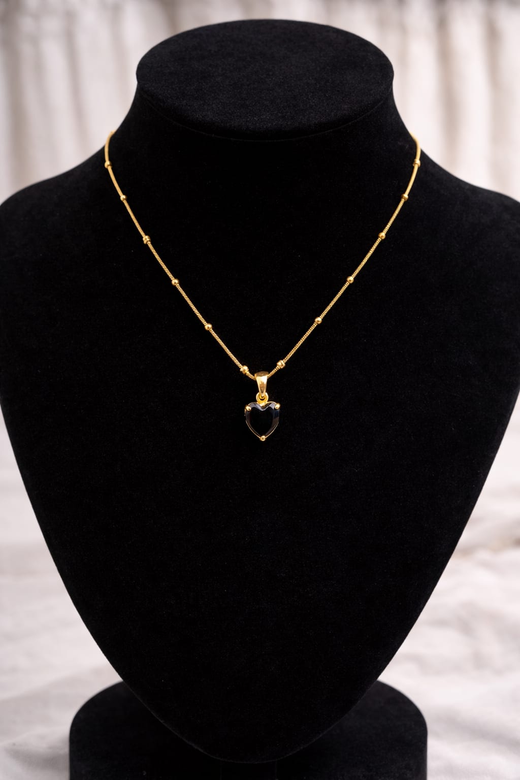 Gold Chain with Heart Pendant
