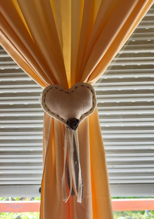 Sujetador de cortinas