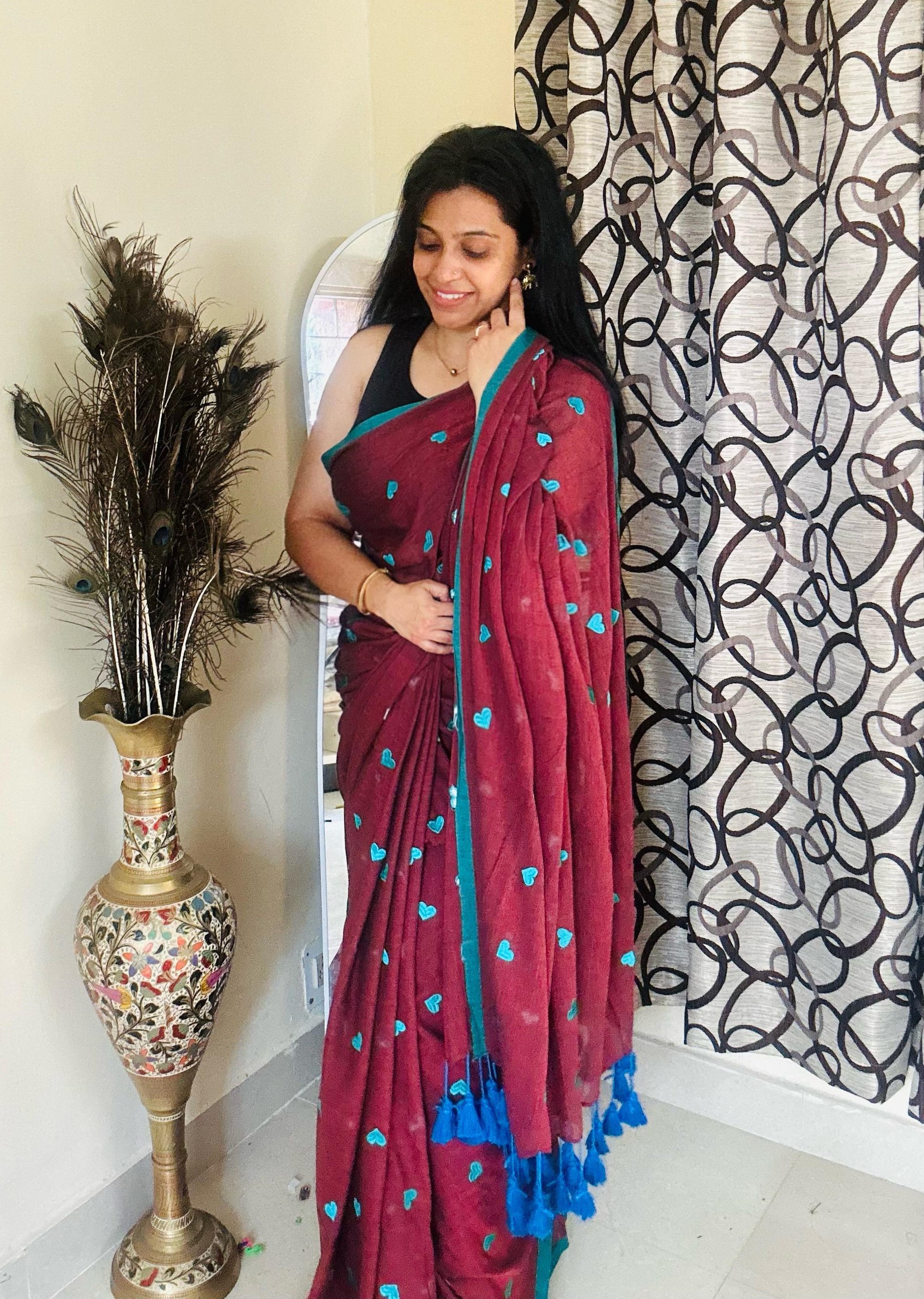 handcrafted cotton saree featuring embroidered heart motifs