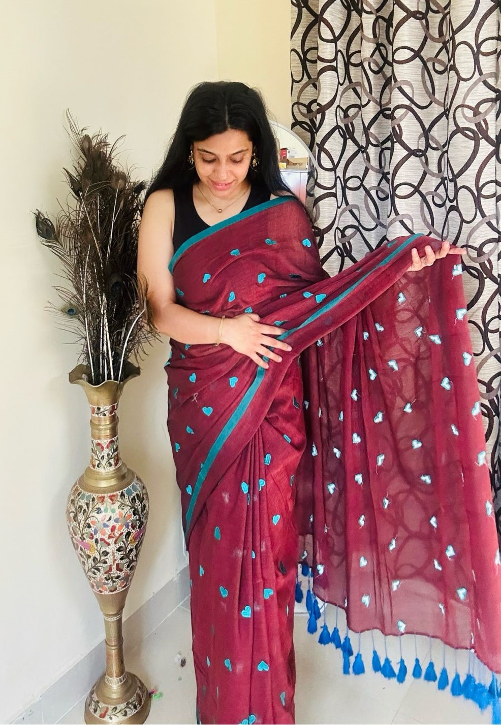 handcrafted cotton saree featuring embroidered heart motifs
