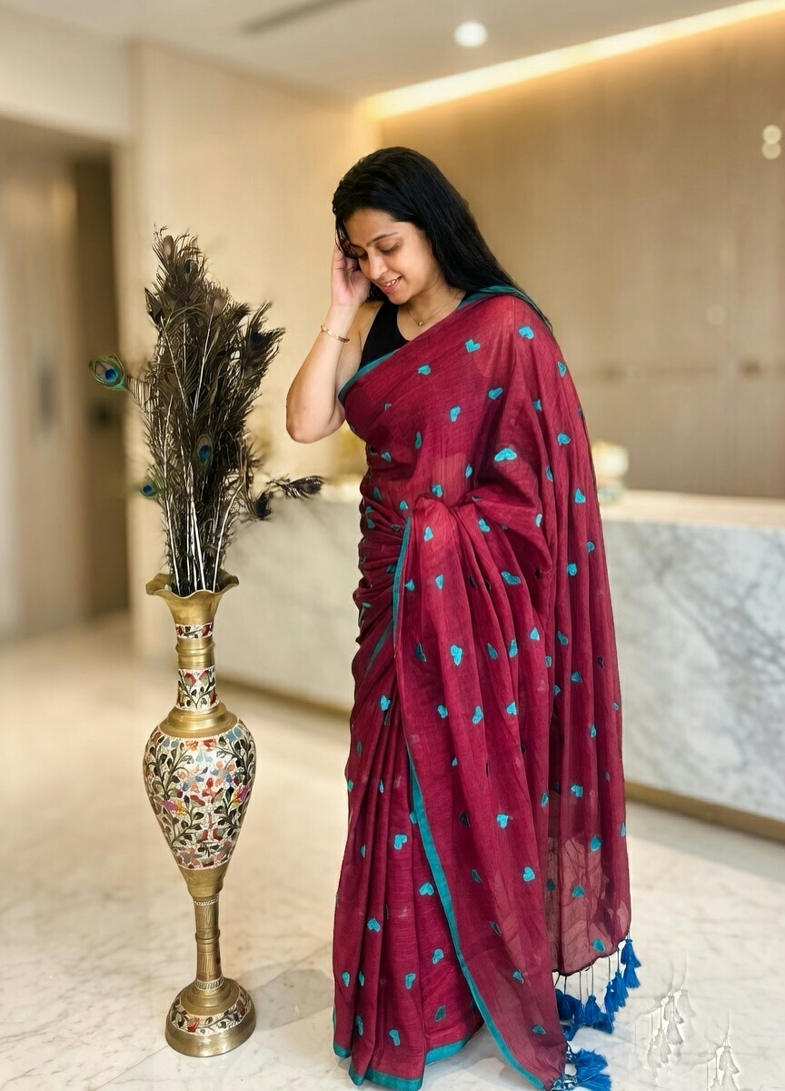 handcrafted cotton saree featuring embroidered heart motifs