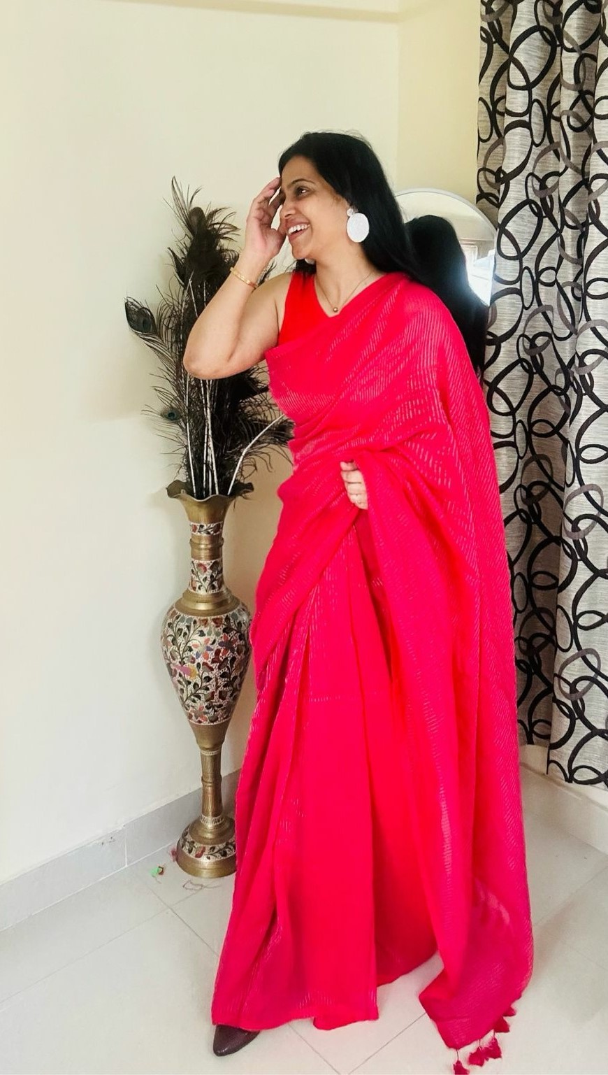 hot pink striped saree with tassel details