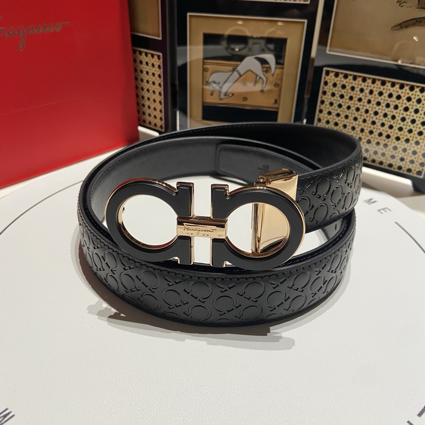 Ferragamo Black belt with gold-finish Gancini buckle [503485]