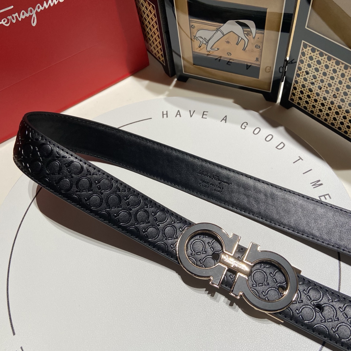 Ferragamo Black belt with gold-finish Gancini buckle [503485]
