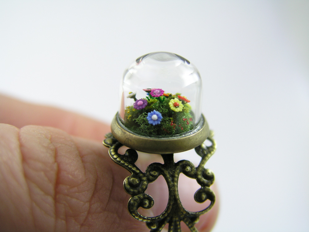 Miniature World Ring. A miniatue garden with tiny flowers.