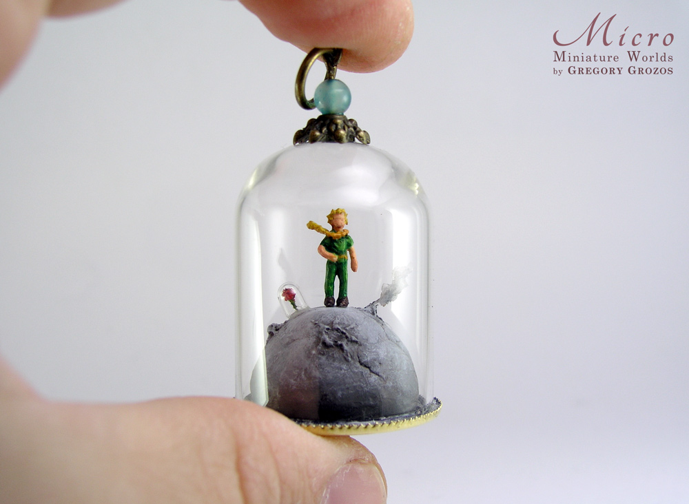 Miniature World - A little boy dressed in green is standing on a lonely planet