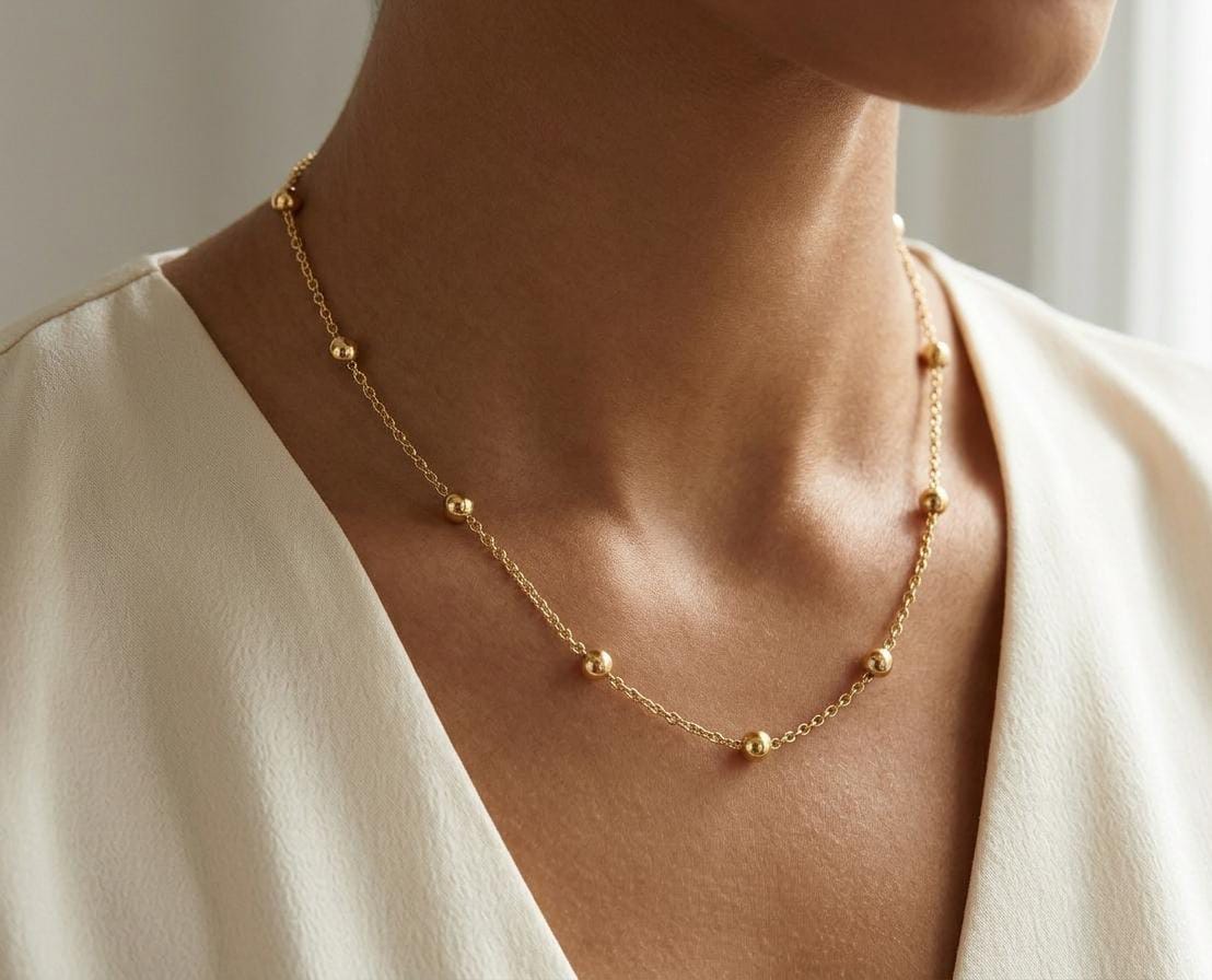 The Solis Golden Bead Station Necklace