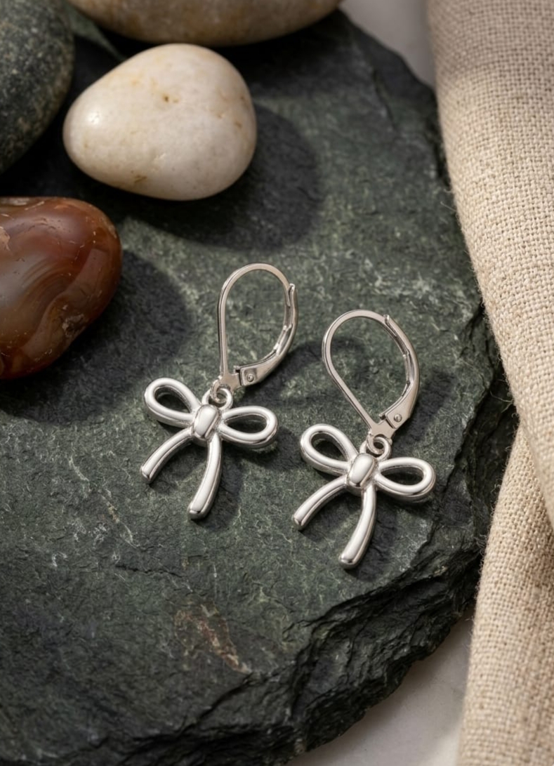 The Silver Ribbon Bows