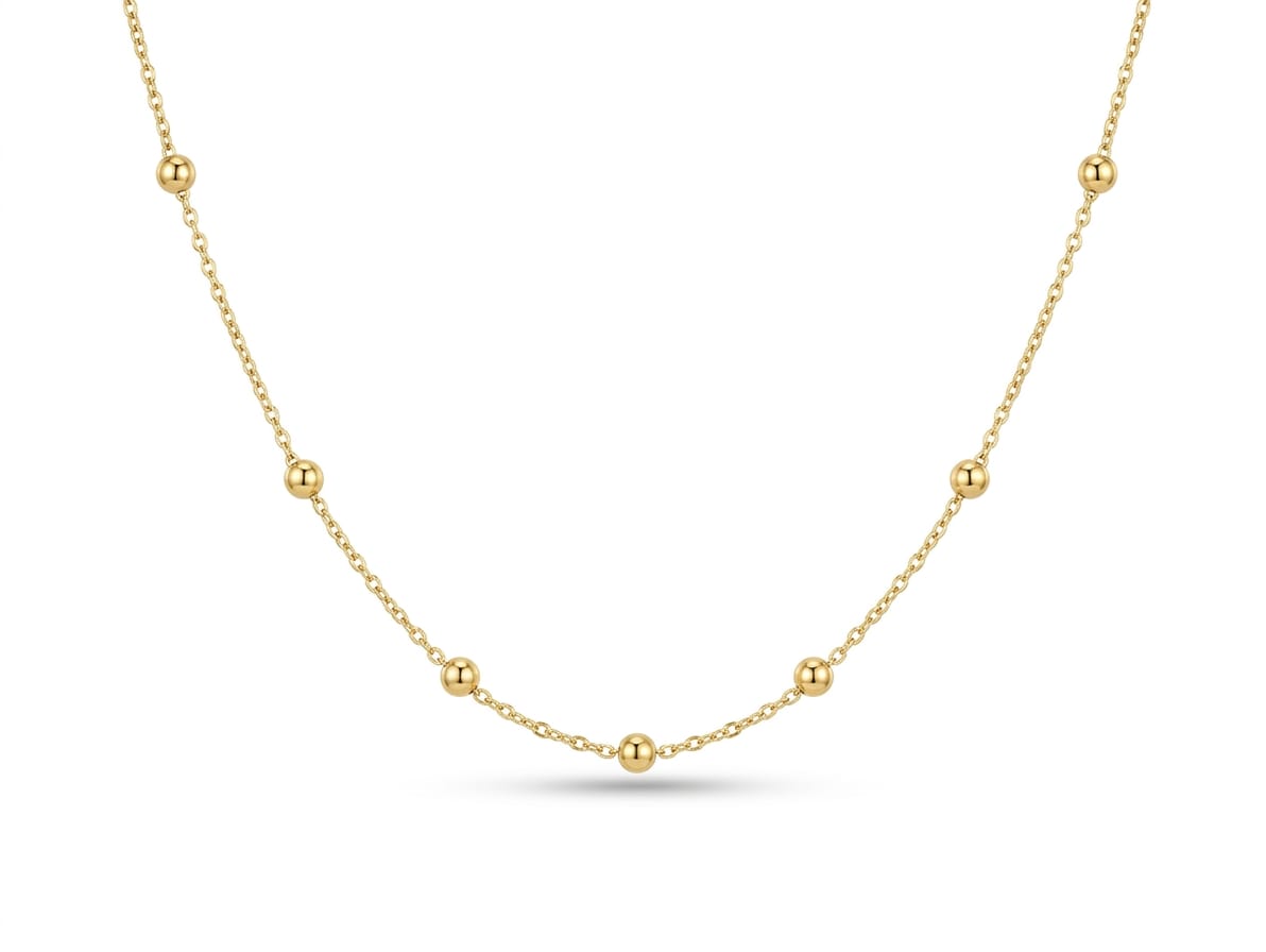 The Solis Golden Bead Station Necklace