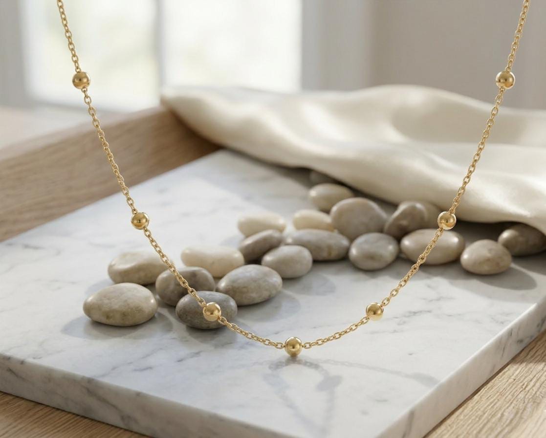 The Solis Golden Bead Station Necklace