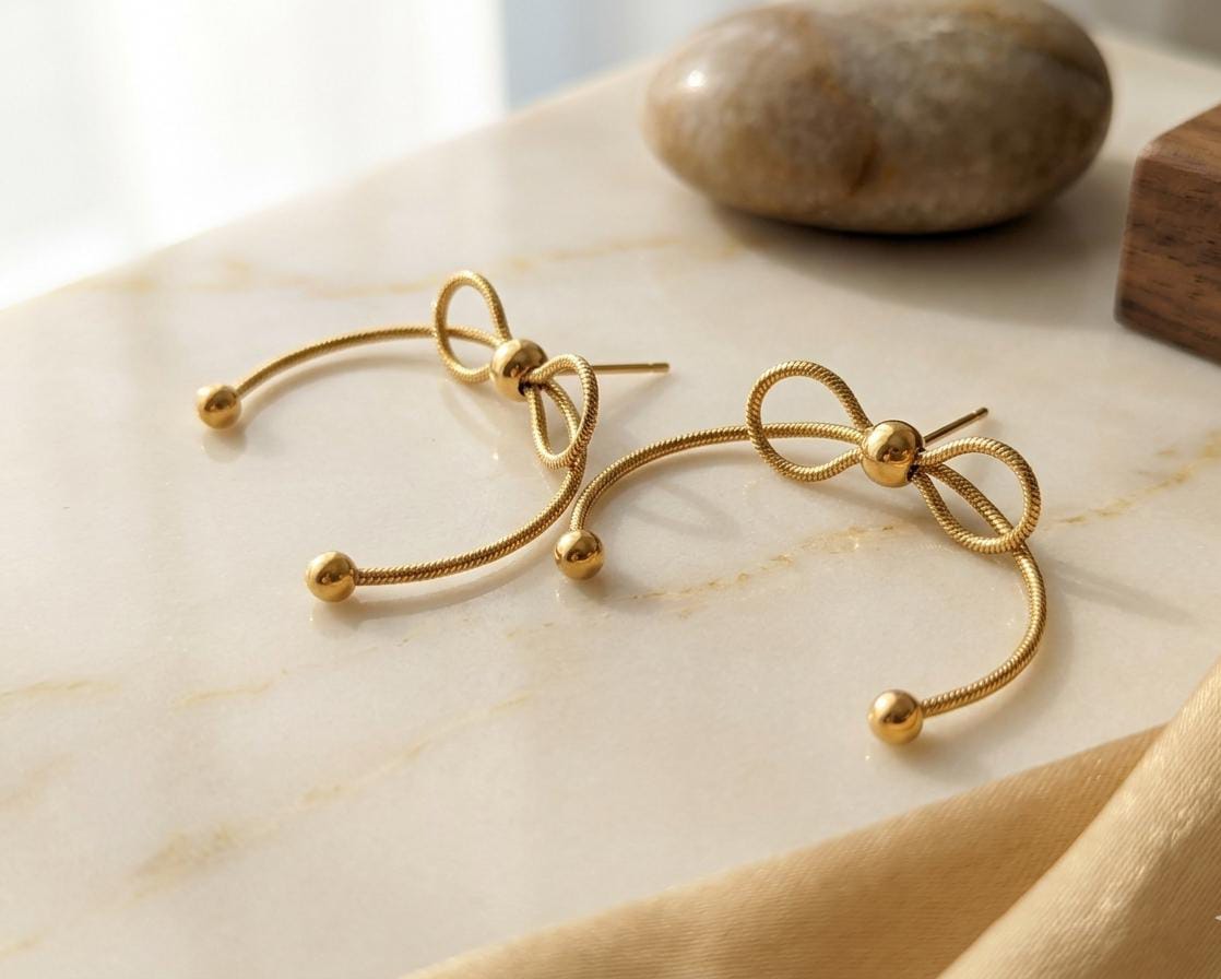 The Gilded Bow Hoop Studs