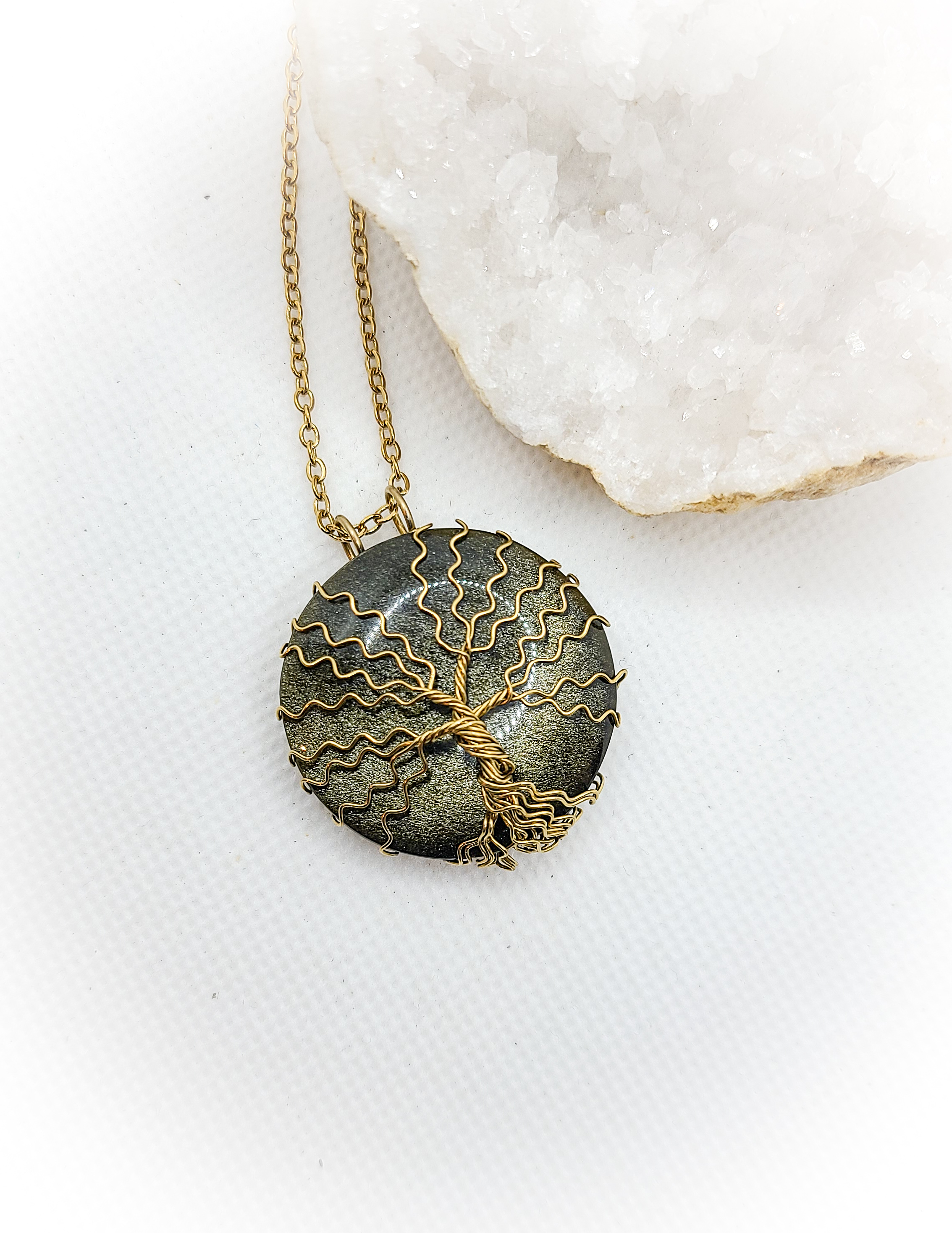 Pendentif arbre de vie en obsidienne dorée