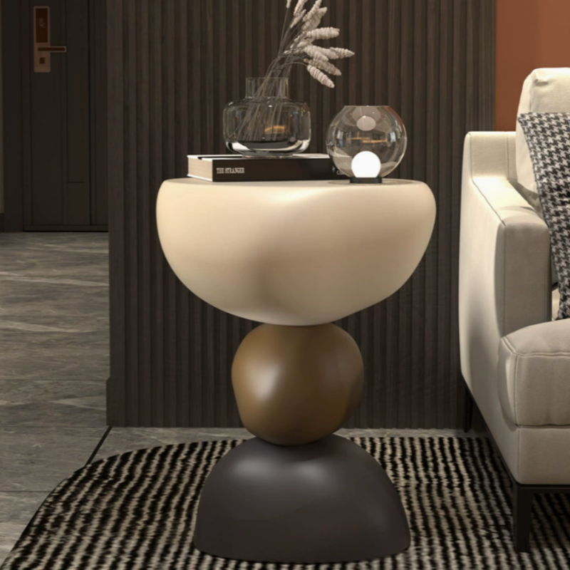 Tavolino laterale moderno dalle forme scultoree