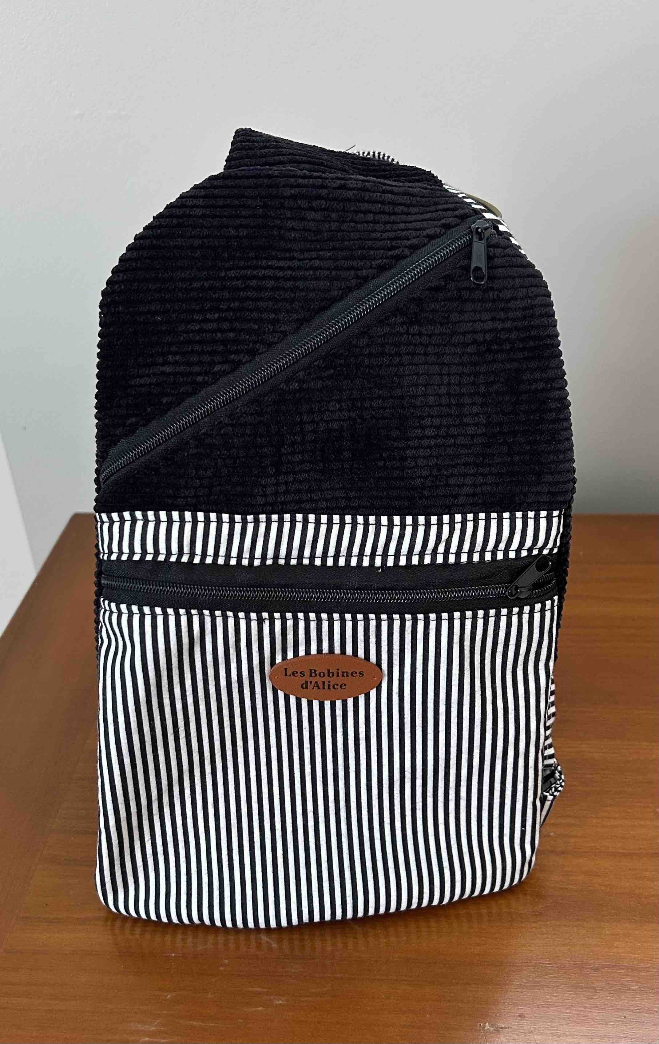 Sac anti-vol en velours noir et coton à rayures