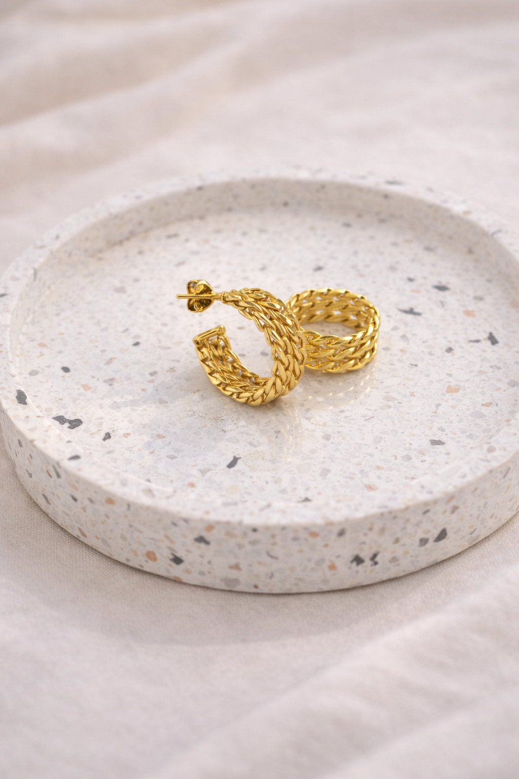 Brinco argola trançado