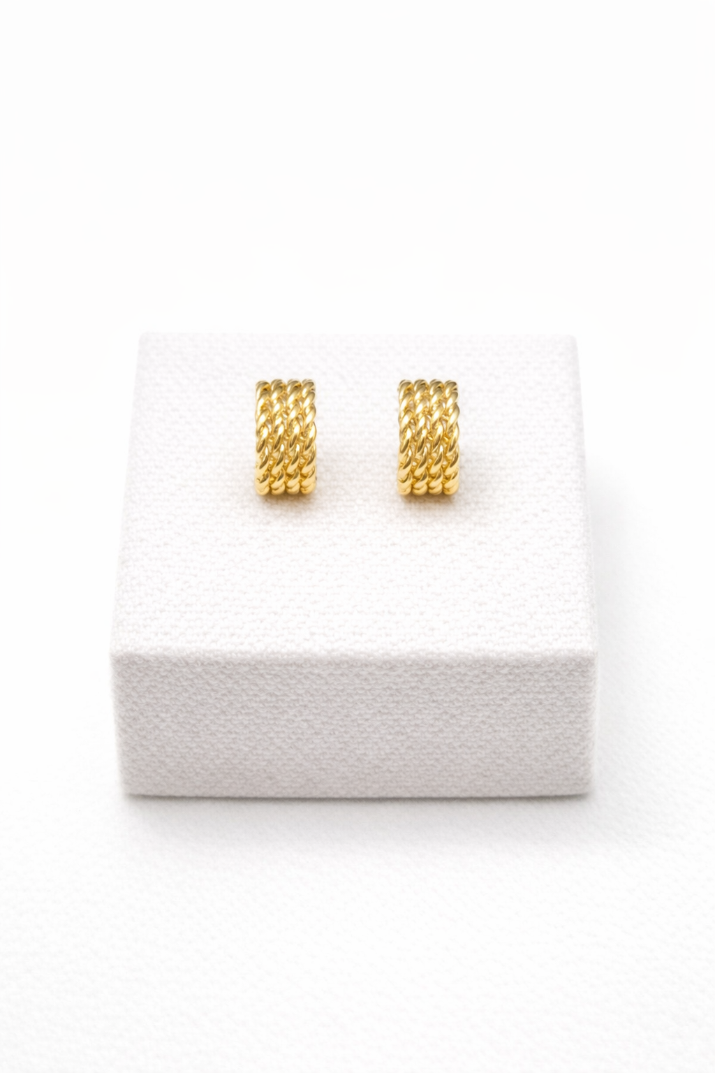 Brinco argola trançado