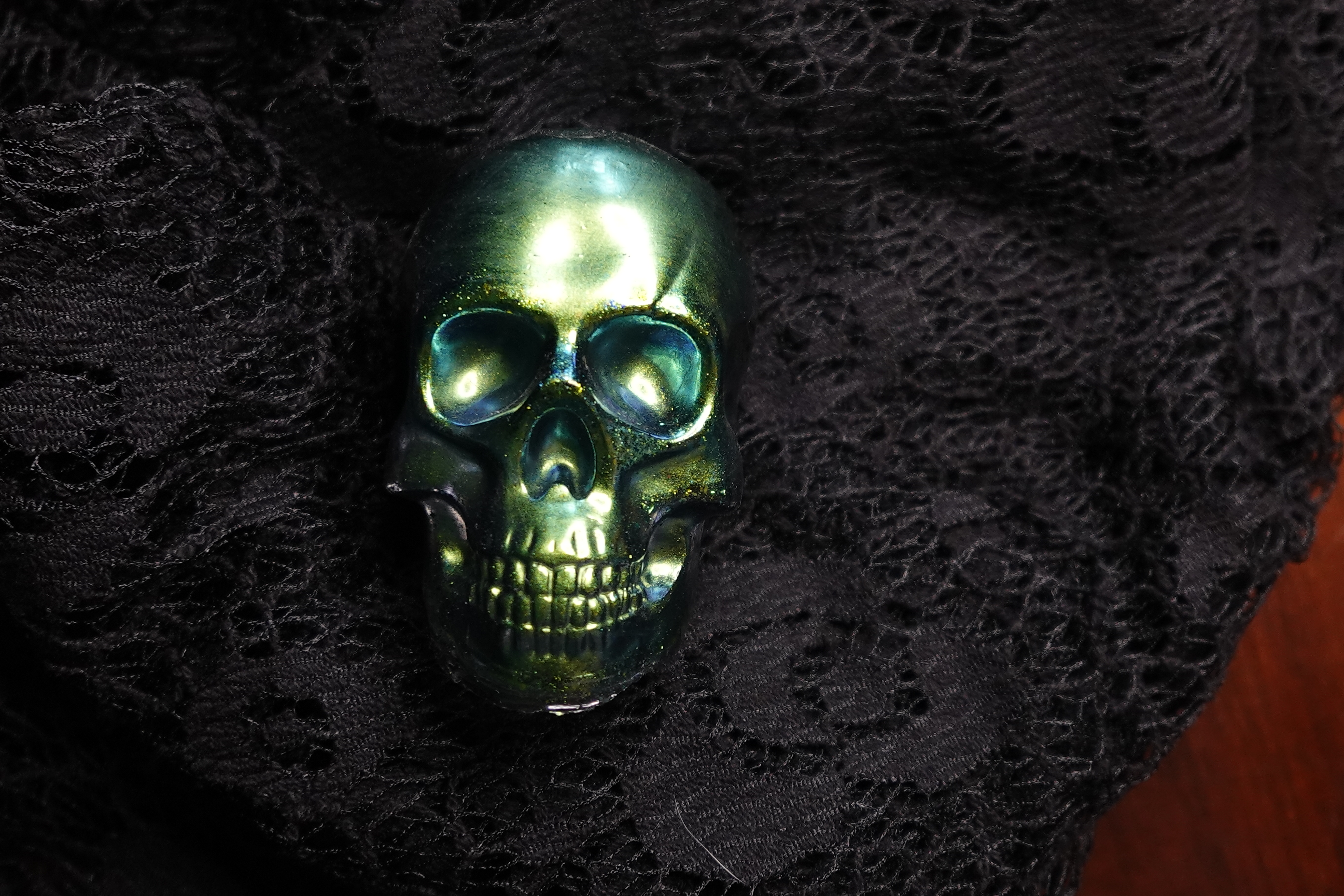 Medium Sized Resin Metallic Green Skull