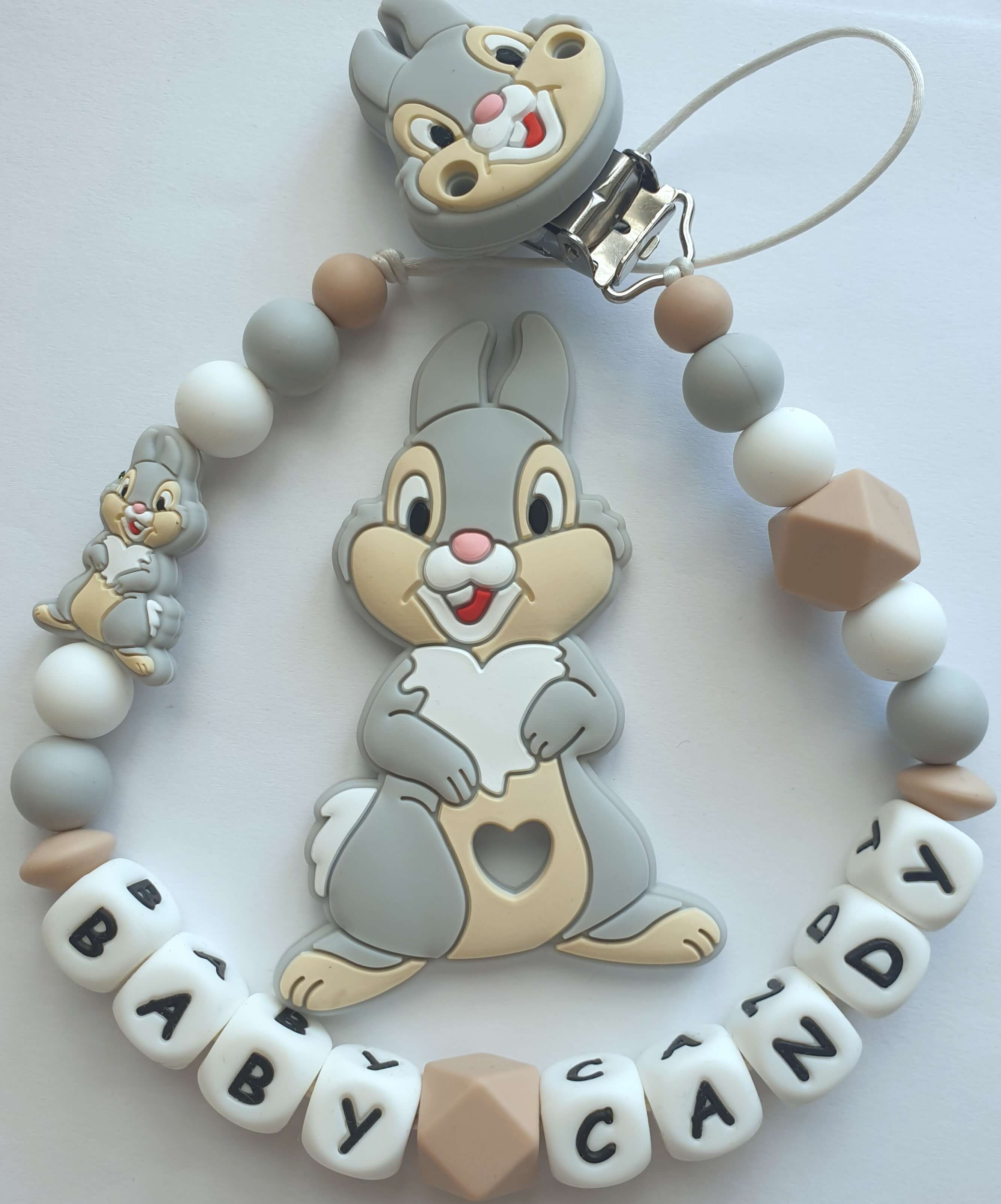 Čiulptuko laikiklis ir kramtukas "Zuikiai"