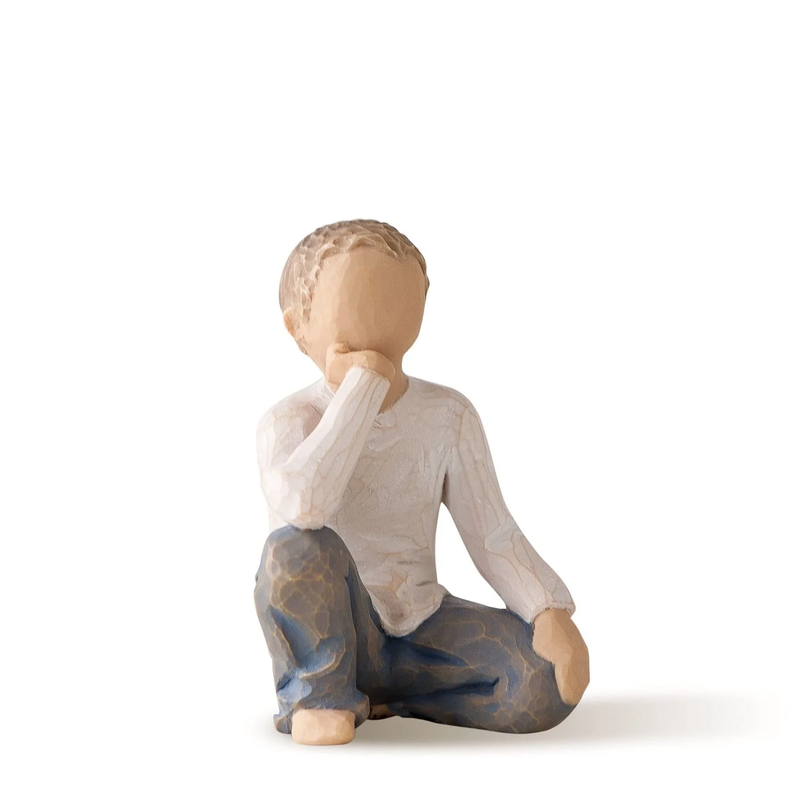 Seated Boy Figurine