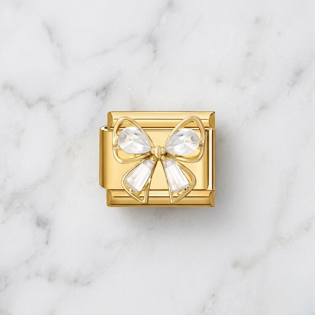 Charm doré nœud cristal