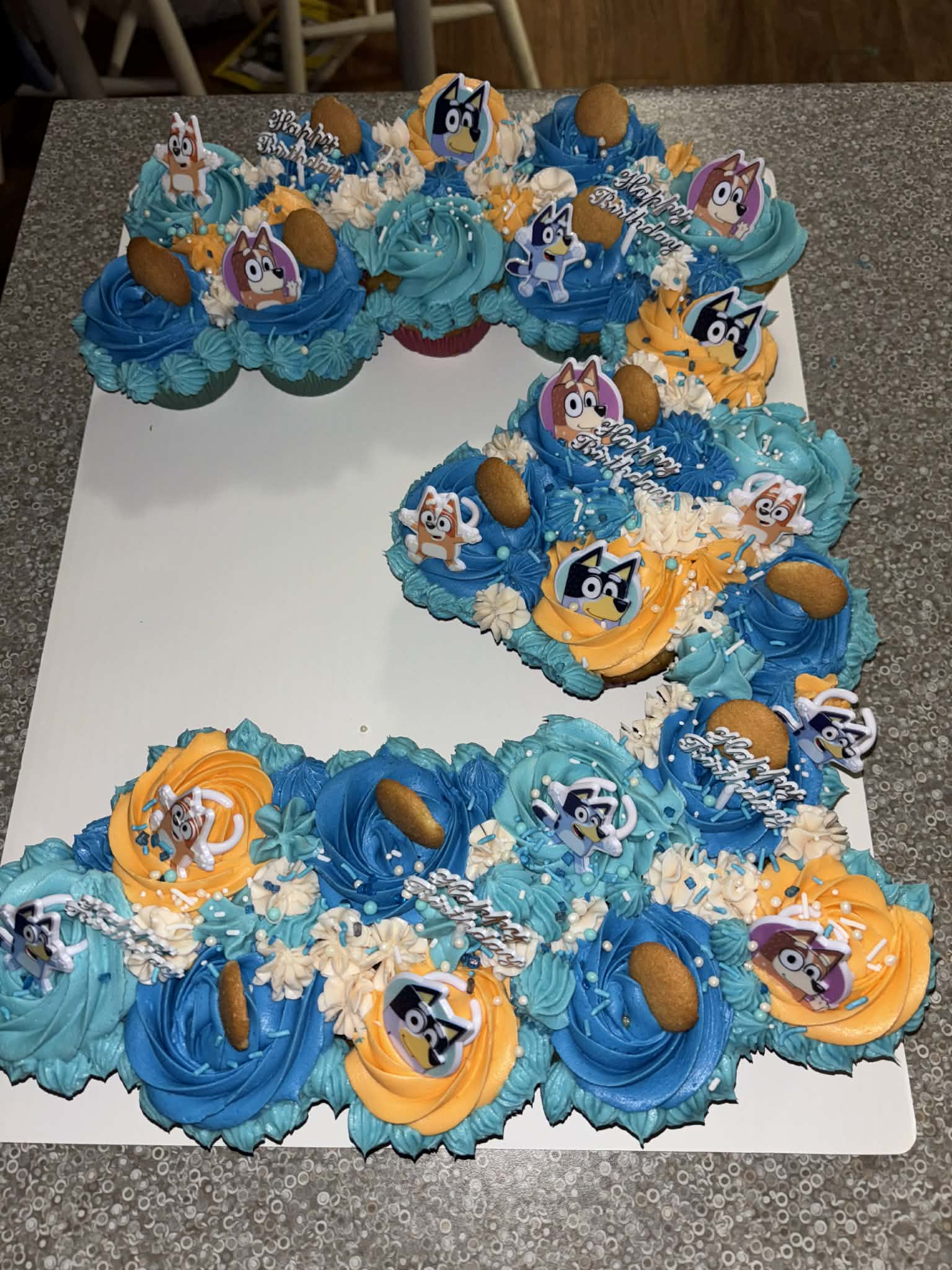 Number 2 Bluey-Themed Birthday Cake