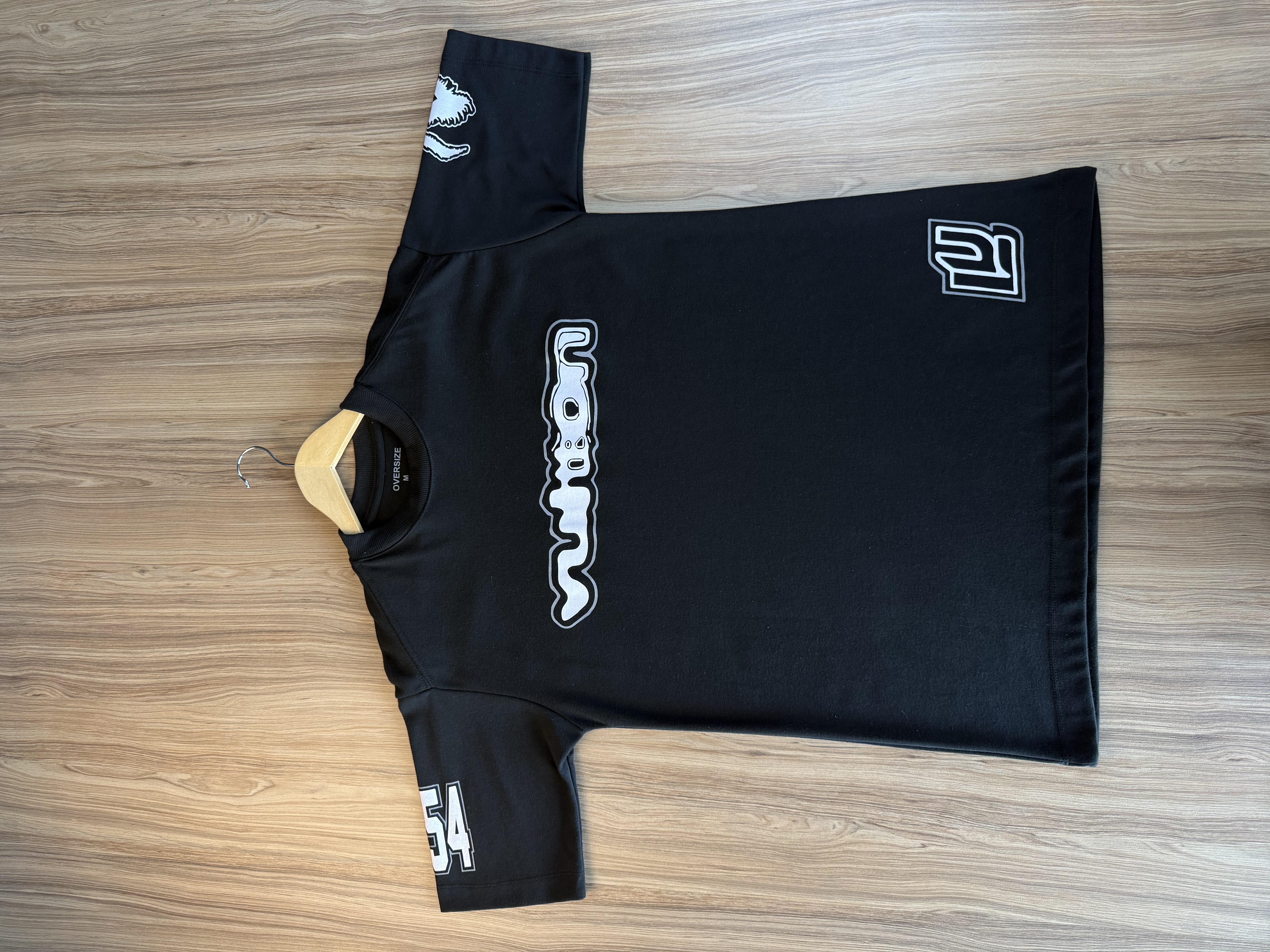 Camiseta Oversized Louis Vuitton Street Logo Preta