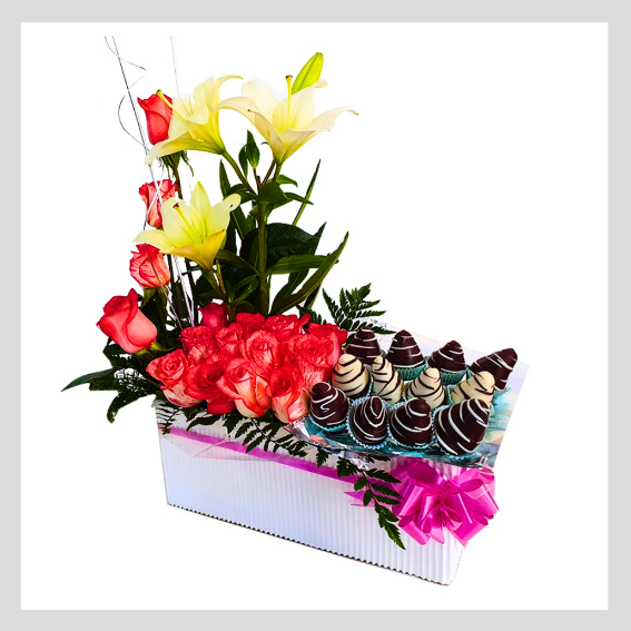 Arreglo floral con chocolates