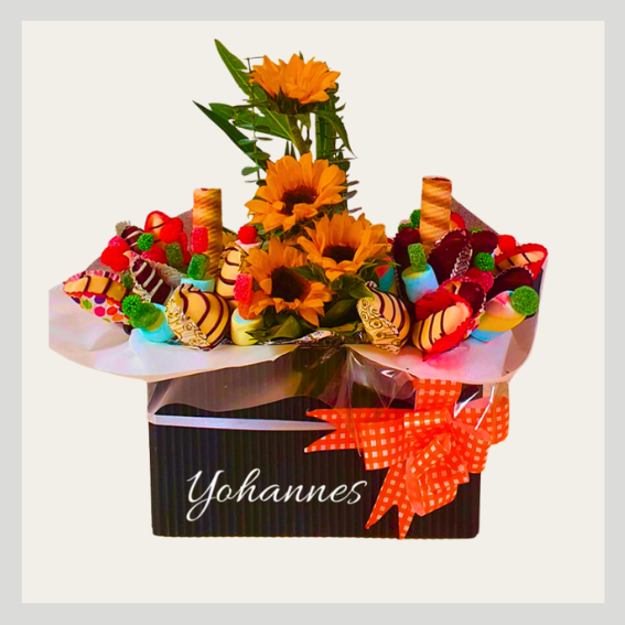 Caja de regalo gourmet con girasoles