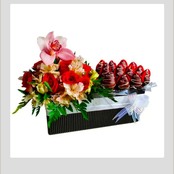 Caja de flores y fresas con chocolate