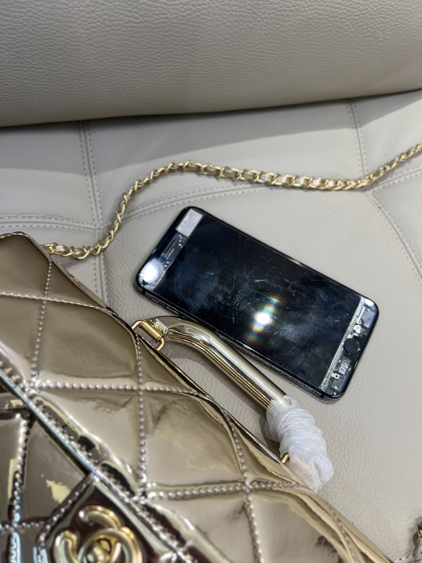 Chanel 25k flap bag, made of patent leather.