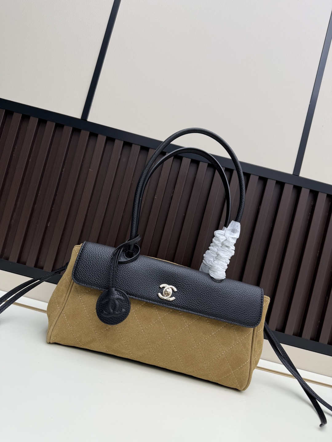 Chanel 25k flap bag, made of suede leather.