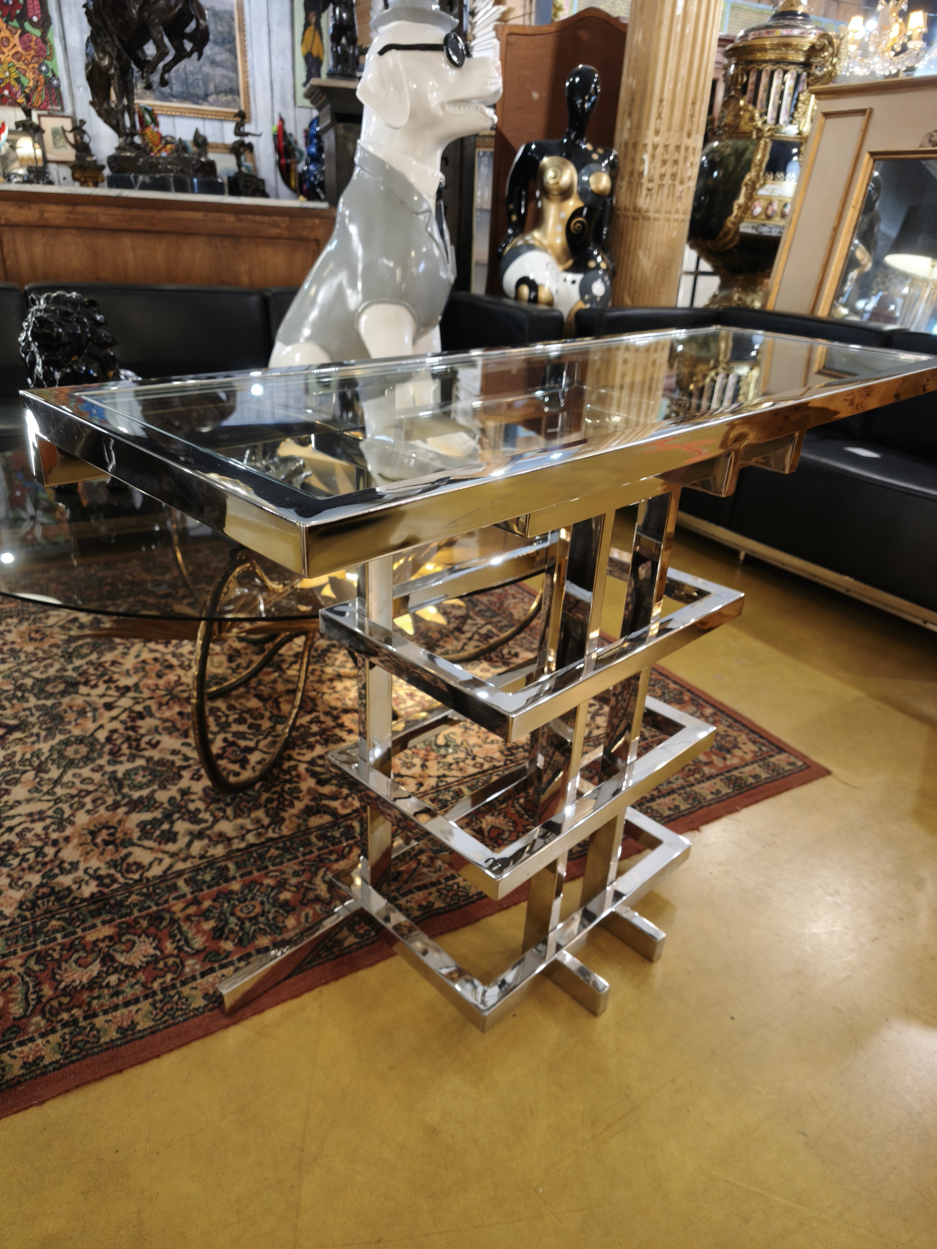 Console design en métal chromé et plateau en verre