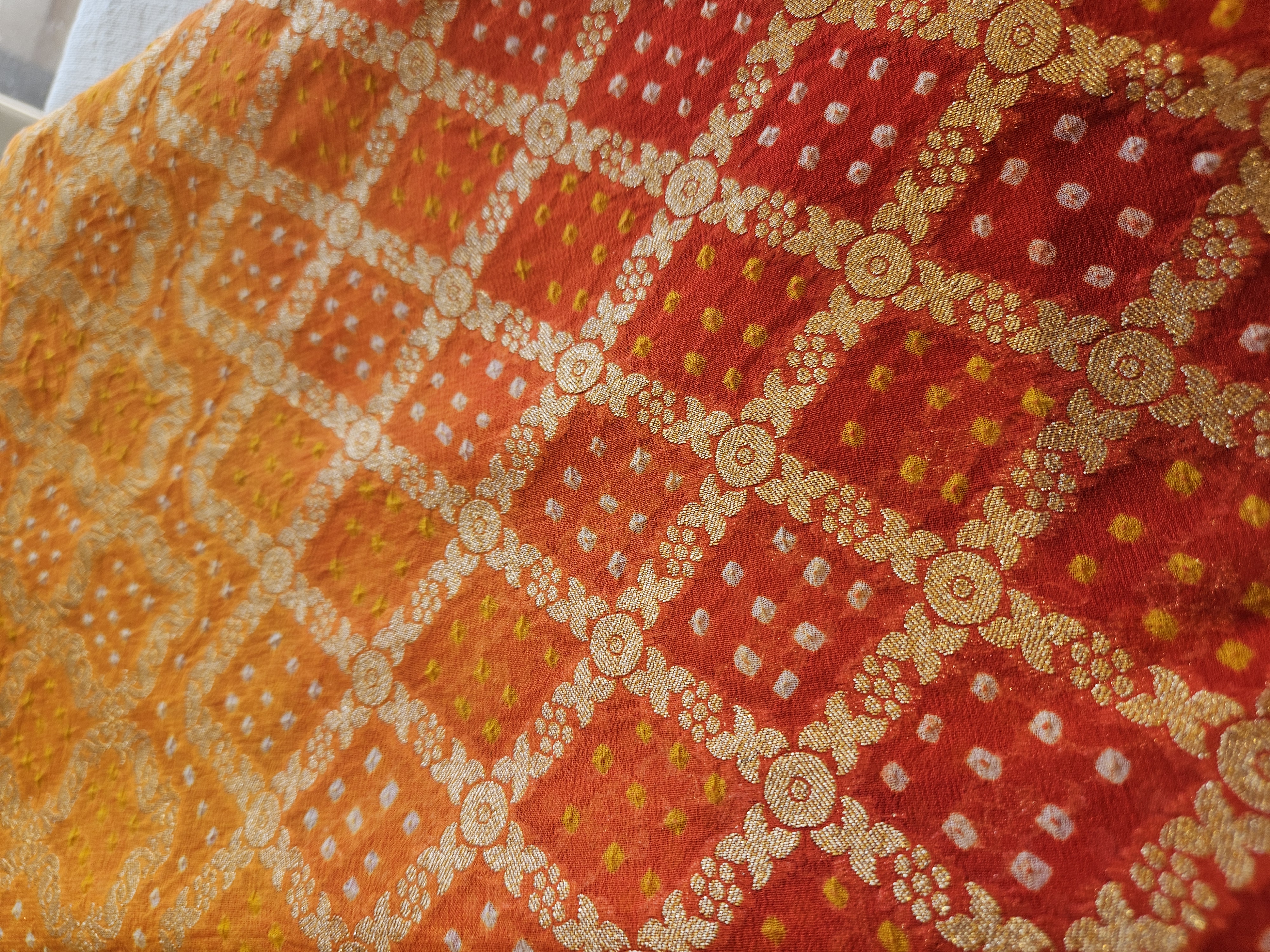 Red & yellow ombré bandhani saree.
