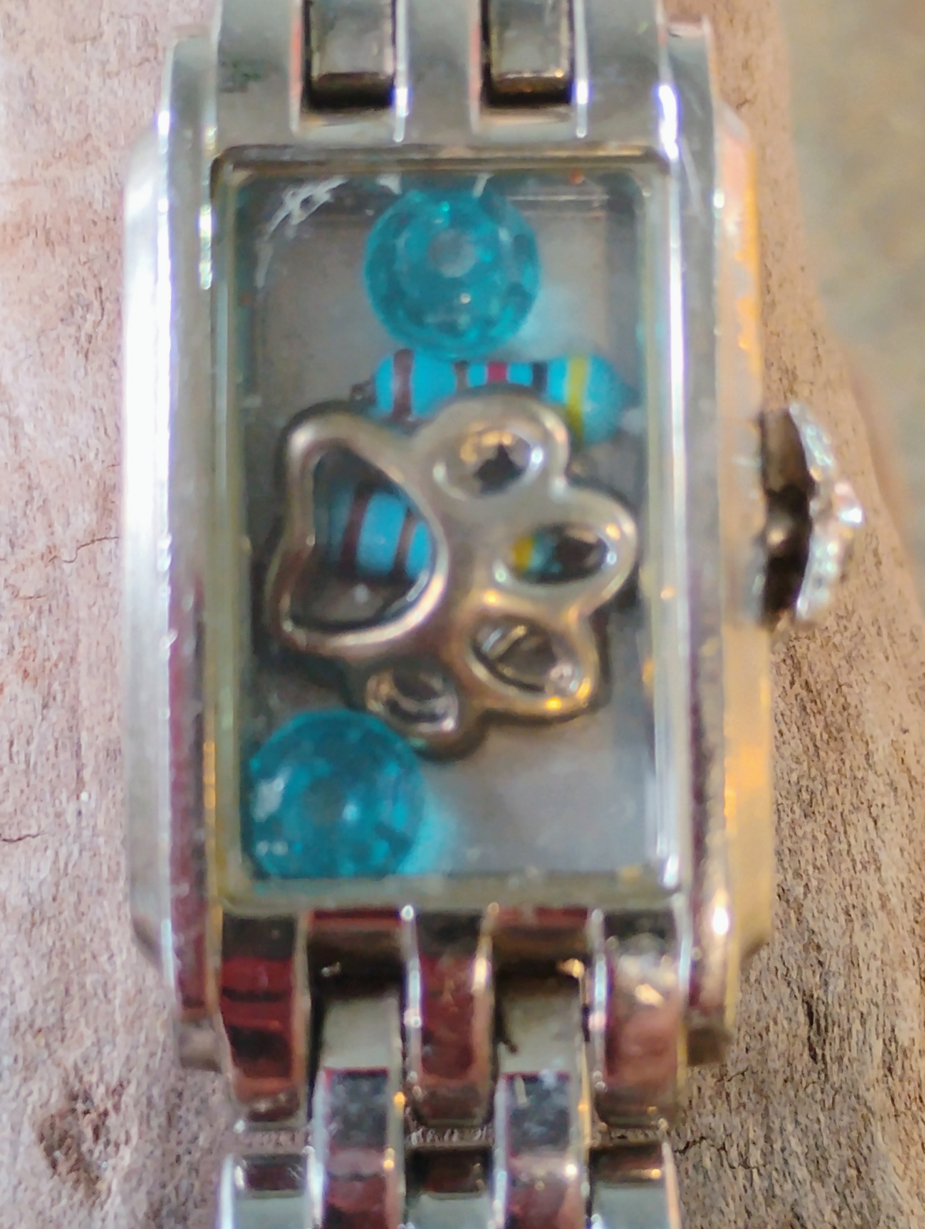 Silver toned Bracelet Watch with Blue Gems and a paw