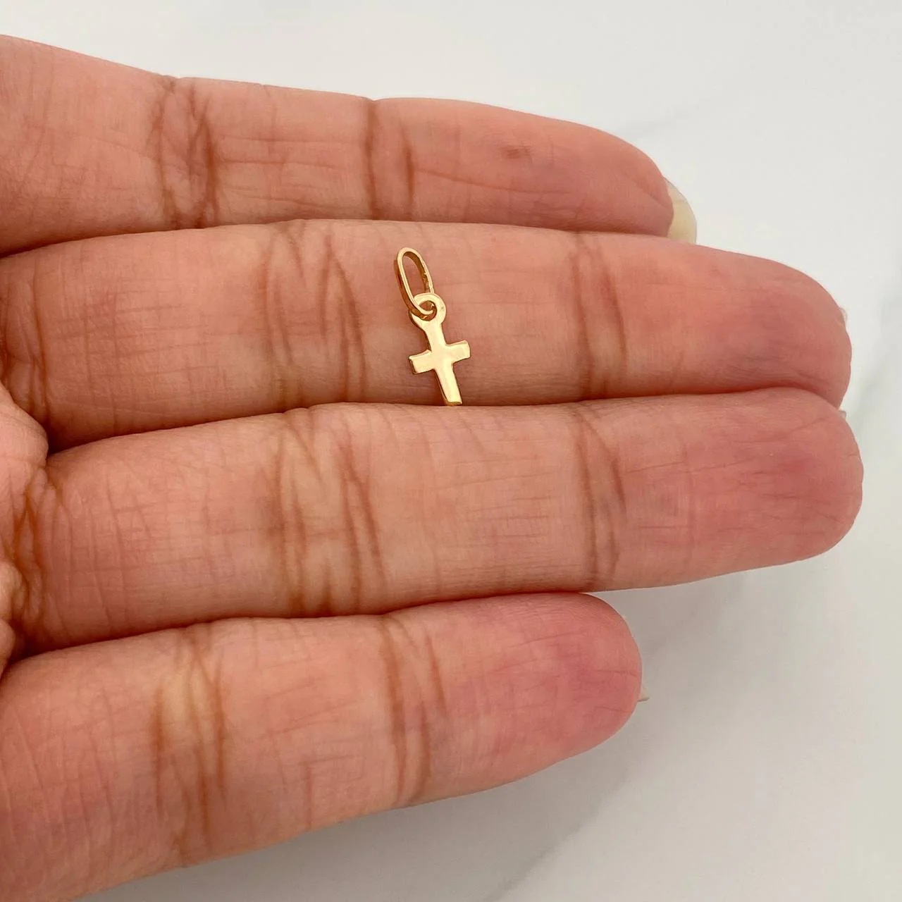 Dije Cruz 0.15gr / 1.3cm / Oro Amarillo 18K %