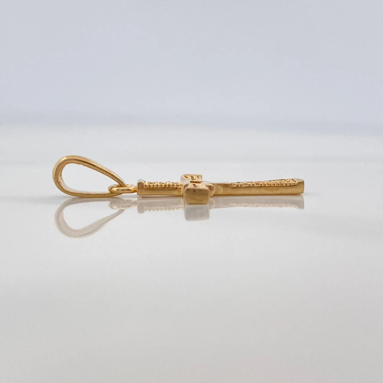 Dije Cruz Articulada 1gr / 2.6cm / Oro Amarillo 18K %