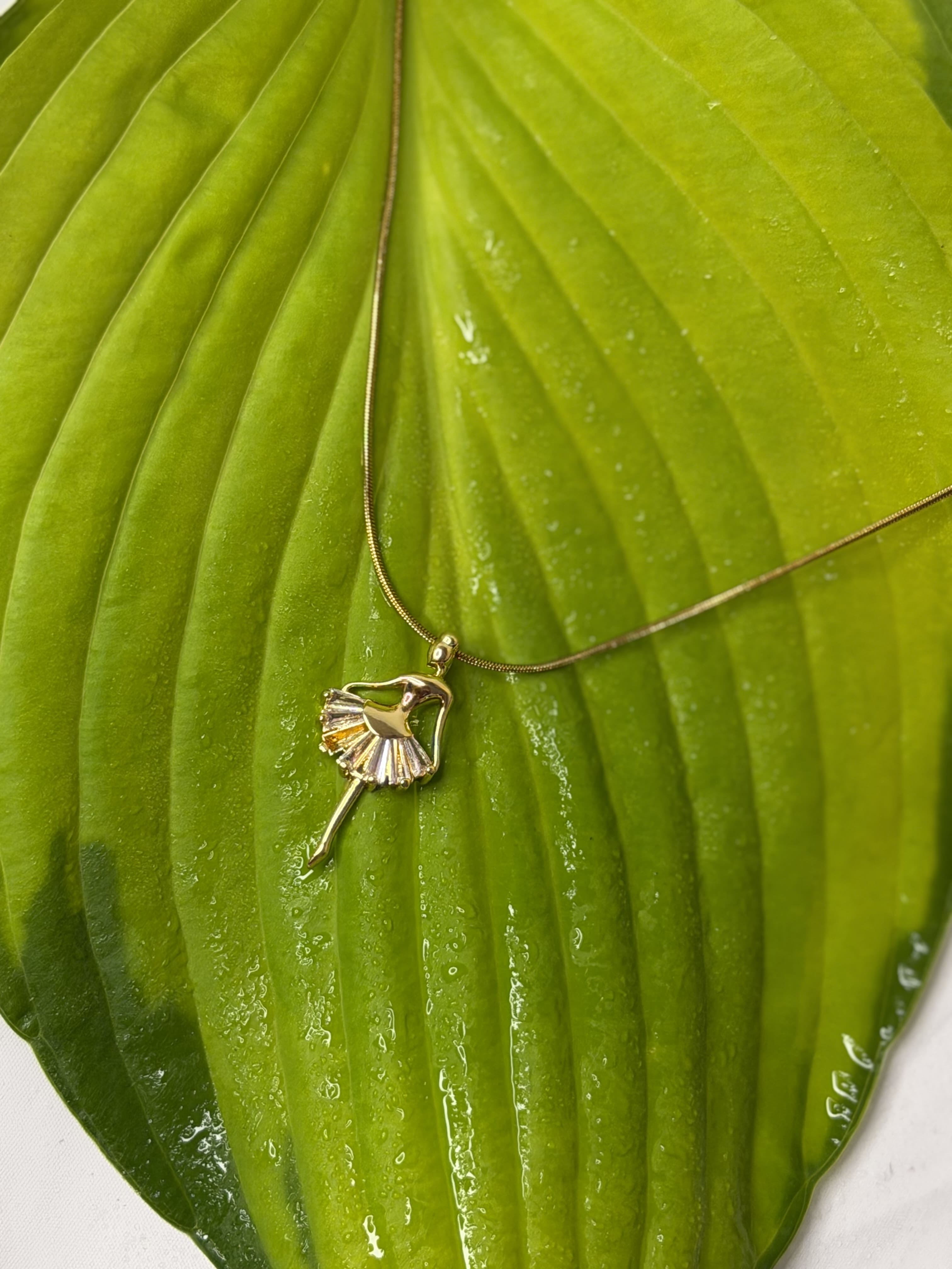 THE EVERGLOW BALLERINA NECKLACE